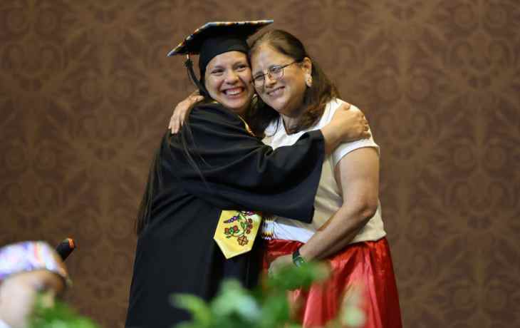 Tina Routh with graduate at Mississippi Choctaw