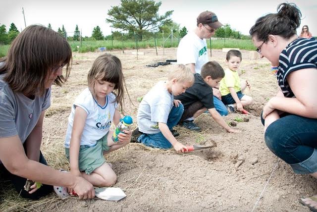 Children Planting at the Waishkey Bay Farm